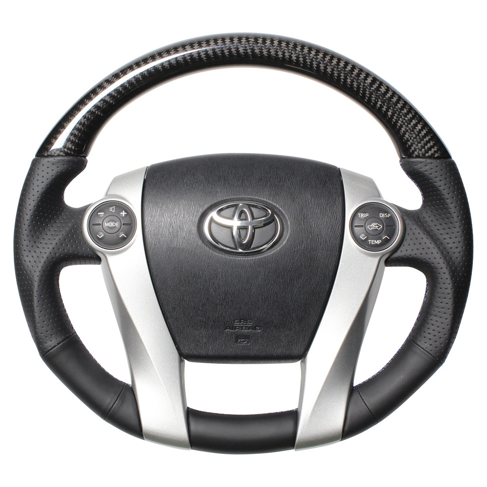 REAL PREMIUM SERIES OVAL SHAPE BLACK CARBON BLUE X SILVER EURO STITCH STEERING WHEEL FOR TOYOTA AQUA NHP10  30-BS-BKC