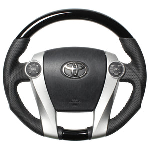 REAL ORIGINAL SERIES OVAL SHAPE PIANO BLACK BLACK STITCH STEERING WHEEL FOR TOYOTA AQUA NHP10  30-2-PBW