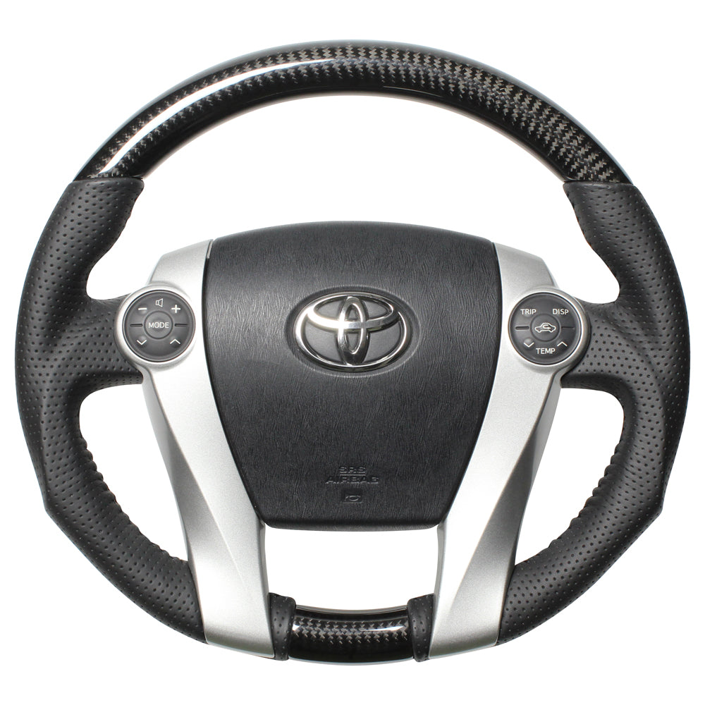 REAL ORIGINAL SERIES OVAL SHAPE BLACK CARBON BLACK STITCH STEERING WHEEL FOR TOYOTA PRIUS 30  30-2-BKC
