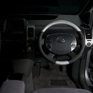 REAL ORIGINAL SERIES OVAL SHAPE SILVER CARBON BLACK STITCH STEERING WHEEL FOR TOYOTA PRIUS EX 20  20-1-SC