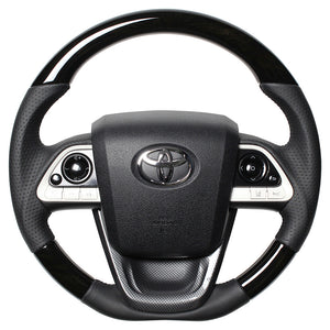 REAL PREMIUM SERIES SET BLACK WOOD STEERING + BLACK CARBON PRINT UNDER PAD BLACK EURO STITCH STEERING WHEEL FOR TOYOTA PRIUS PHV 50  50P-BKW-BK-BKT