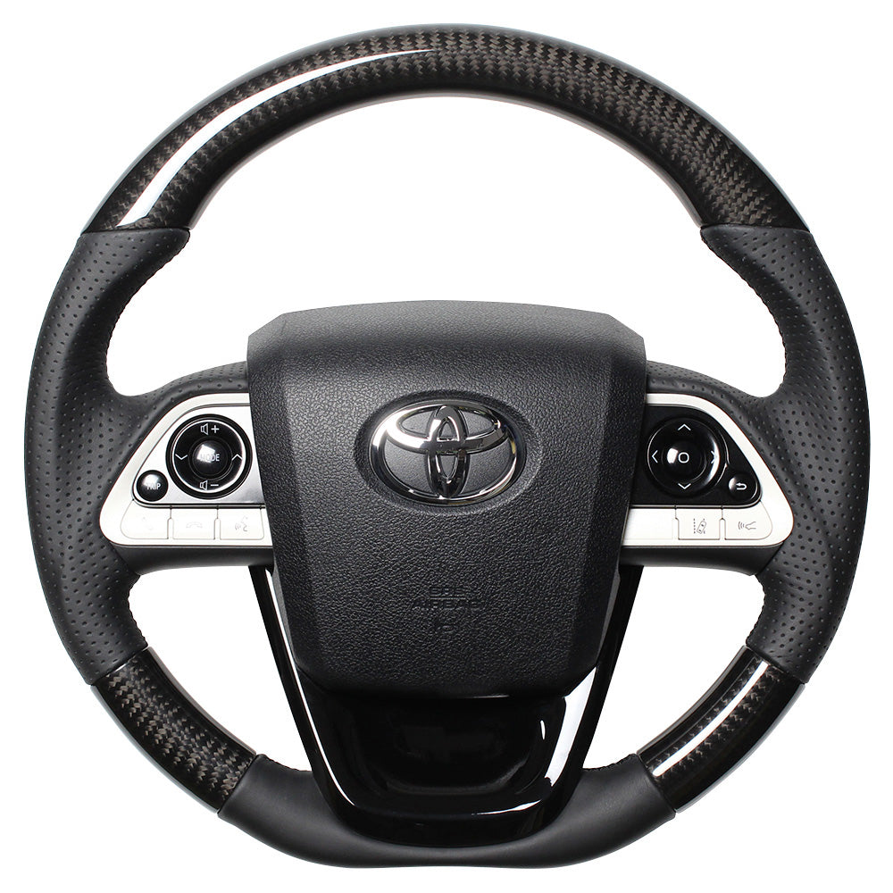 REAL PREMIUM SERIES SET BLACK CARBON STEERING + PIANO BLACK UNDER PAD BLACK EURO STITCH STEERING WHEEL FOR TOYOTA MIRAI 10  50P-BKC-BK-PBP