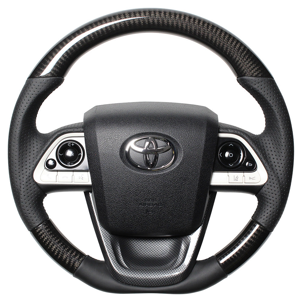 REAL PREMIUM SERIES SET BLACK CARBON STEERING + BLACK CARBON PRINT UNDER PAD BLACK EURO STITCH STEERING WHEEL FOR TOYOTA MIRAI 10  50P-BKC-BK-BKT