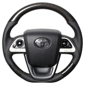 REAL PREMIUM SERIES SET BLACK CARBON STEERING + BLACK CARBON PRINT UNDER PAD BLACK EURO STITCH STEERING WHEEL FOR TOYOTA PRIUS 50  50P-BKC-BK-BKT