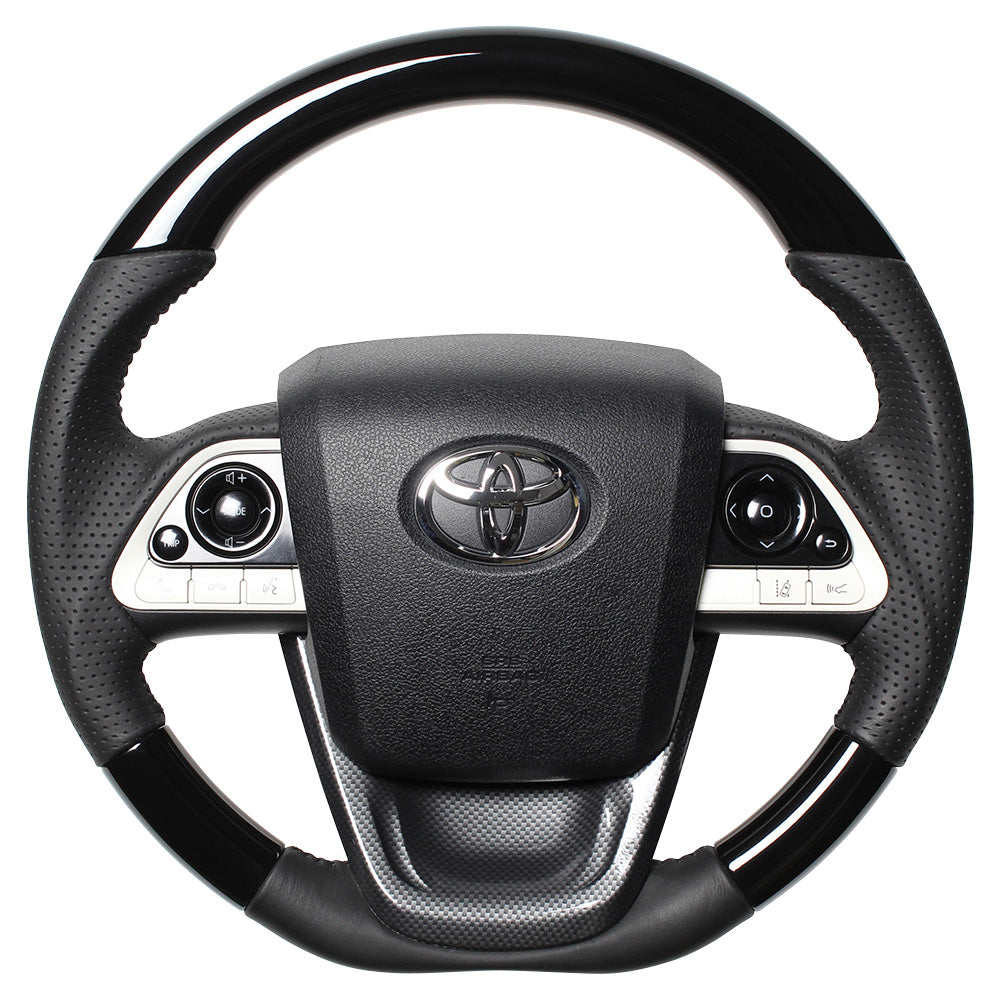 REAL ORIGINAL SERIES SET PIANO BLACK STEERING + BLACK CARBON PRINT UNDER PAD BLACK STITCH STEERING WHEEL FOR TOYOTA PRIUS 50  50-PBW-BK-BKT