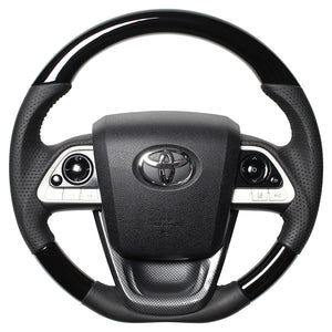 REAL ORIGINAL SERIES SET PIANO BLACK STEERING + BLACK CARBON PRINT UNDER PAD BLACK STITCH STEERING WHEEL FOR TOYOTA PRIUS 50  50-PBW-BK-BKT