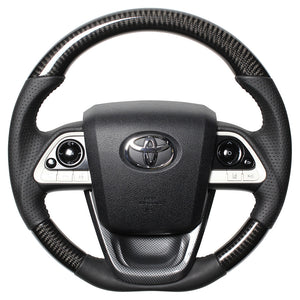 REAL ORIGINAL SERIES SET BLACK CARBON STEERING + BLACK CARBON PRINT UNDER PAD BLACK STITCH STEERING WHEEL FOR TOYOTA PRIUS 50  50-BKC-BK-BKT