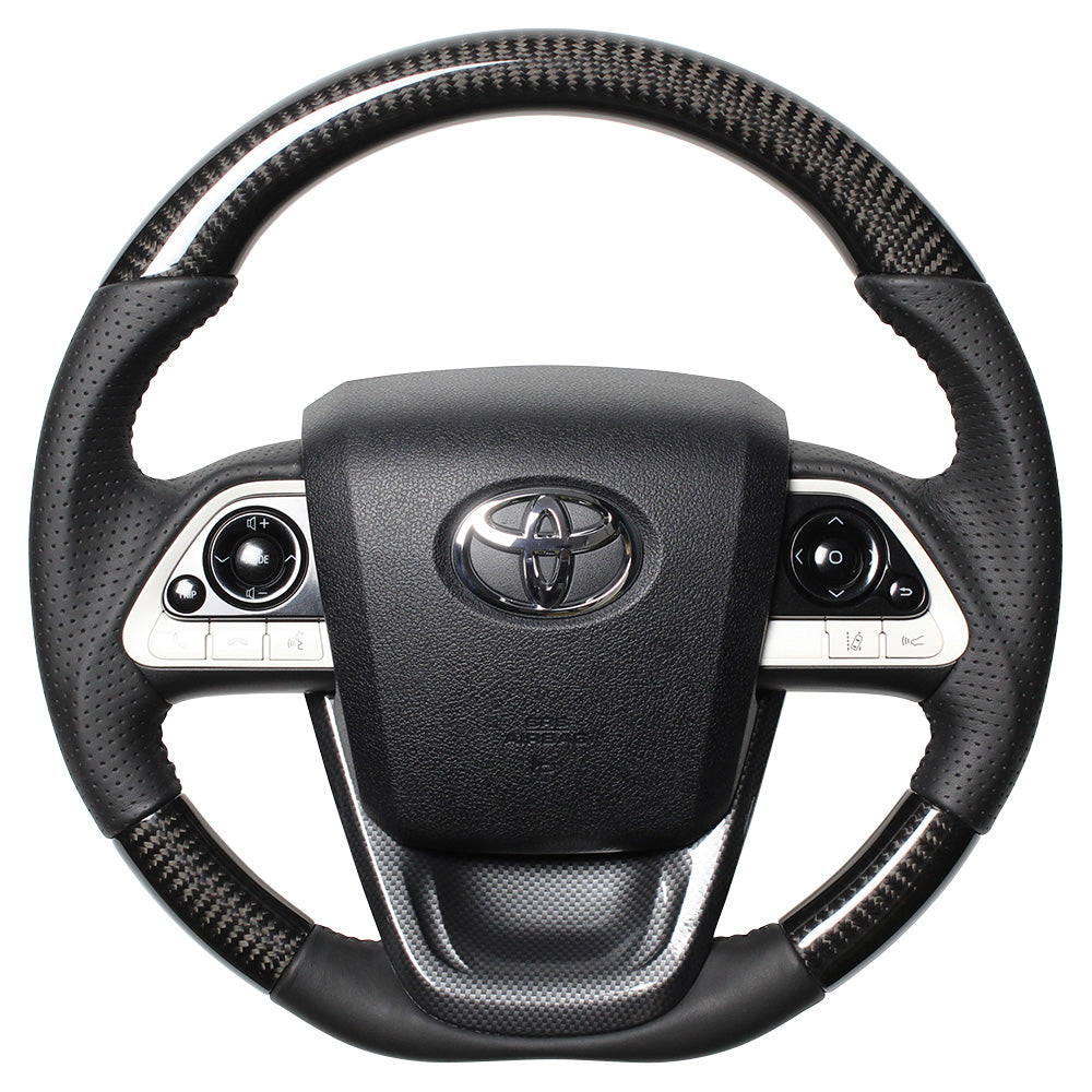 REAL ORIGINAL SERIES SET BLACK CARBON STEERING + BLACK CARBON PRINT UNDER PAD BLACK STITCH STEERING WHEEL FOR TOYOTA PRIUS PHV 50  50-BKC-BK-BKT