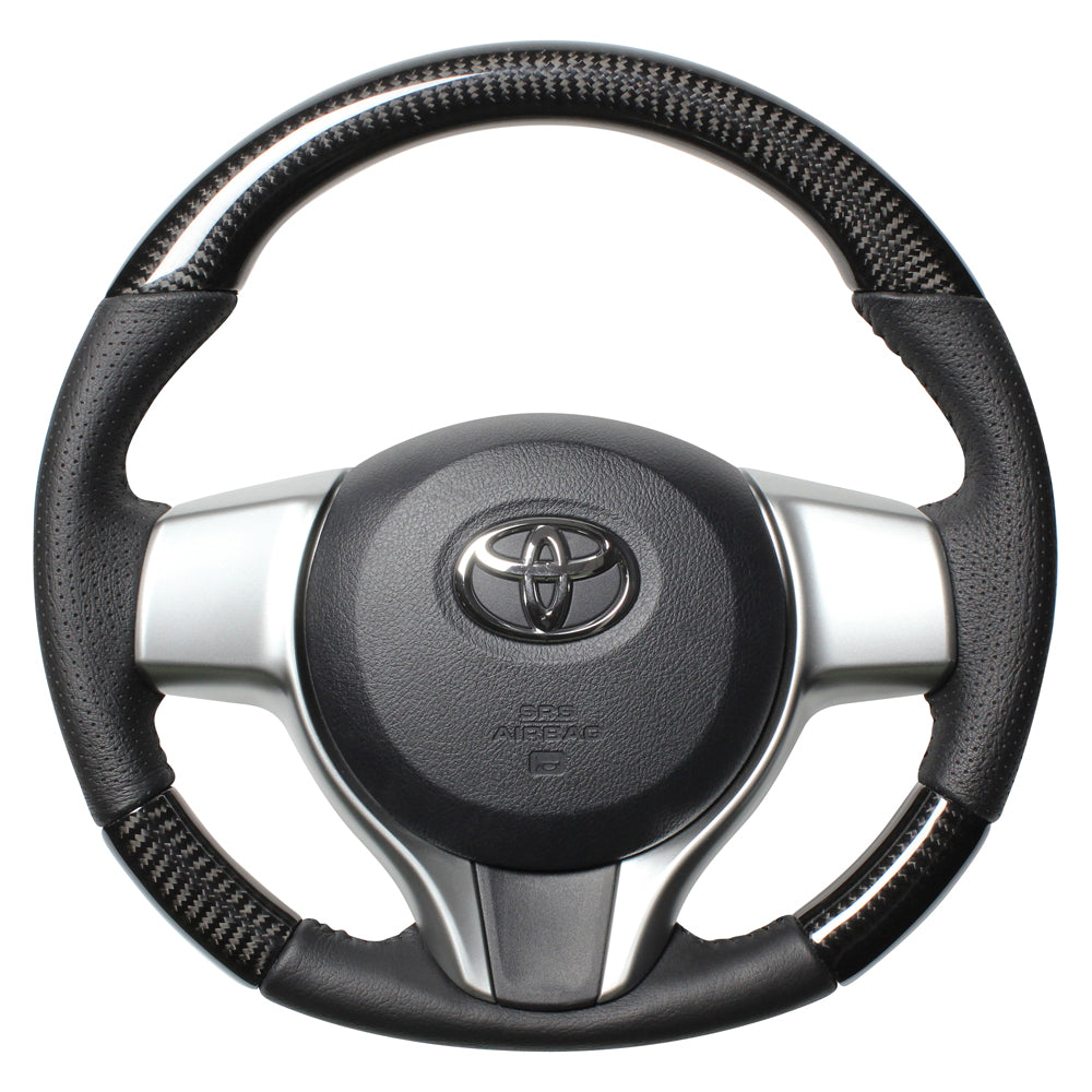 REAL ORIGINAL SERIES SOFT D SHAPE BLACK CARBON BLACK STITCH STEERING WHEEL FOR TOYOTA RACTIS 120  P130-BKC-BK