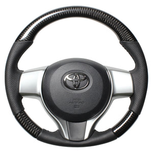 REAL ORIGINAL SERIES SOFT D SHAPE BLACK CARBON BLACK STITCH STEERING WHEEL FOR TOYOTA RACTIS 120  P130-BKC-BK