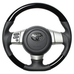 REAL ORIGINAL SERIES SOFT D SHAPE PIANO BLACK BLACK STITCH STEERING WHEEL FOR TOYOTA FJ CRUISER GSJ15W FJ-PBW-BK