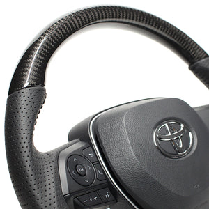 REAL ORIGINAL SERIES SOFT D SHAPE BLACK CARBON BLACK STITCH STEERING WHEEL FOR TOYOTA COROLLA 210  TYA-BKC