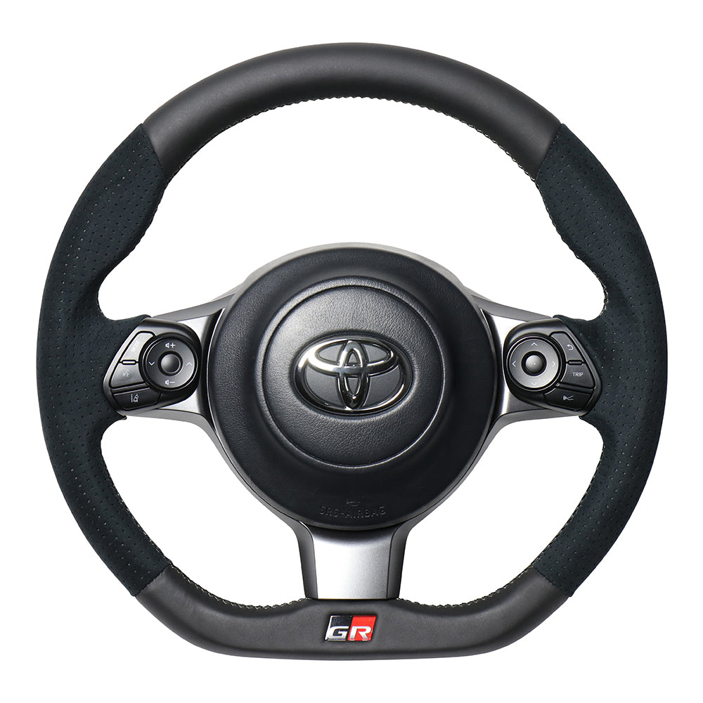 REAL ORIGINAL SERIES EMBLEM TYPE D SHAPE BLACK LEATHER & BLACK ULTRA SUEDE SILVER X BLACK EURO STITCH STEERING WHEEL FOR TOYOTA GR86 ZN8  GRM-ALC-SL