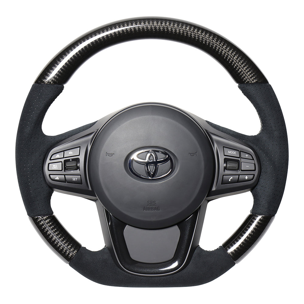 REAL PREMIUM SERIES D SHAPE BLACK CARBON & BLACK ULTRA SUEDE SILVER EURO STITCH STEERING WHEEL FOR TOYOTA SUPRA DB TYPE  TYCP-ALC-BKC - Black Hawk Japan