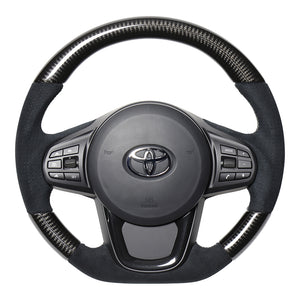 REAL PREMIUM SERIES D SHAPE BLACK CARBON & BLACK ULTRA SUEDE SILVER EURO STITCH STEERING WHEEL FOR TOYOTA SUPRA DB TYPE  TYCP-ALC-BKC - Black Hawk Japan