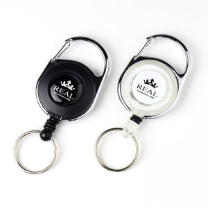 REAL REEL KEYCHAIN WITH REAL LOGO SMALL WHITE REAL-REEL-WH